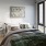 Well-lit primary bedroom with handsome morning views