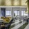 Lounge with soft seating and kitchen and views
