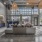 Gorgeous two story common space area with plush seating and natural light at Miscela Somerville Apartments at Assembly Row