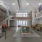Resident lounge with soft seating and long table with seating
