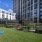 Courtyard with fire pit, greenspace lawn and indoor/outdoor gym