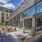 Outdoor courtyard with seating and green space